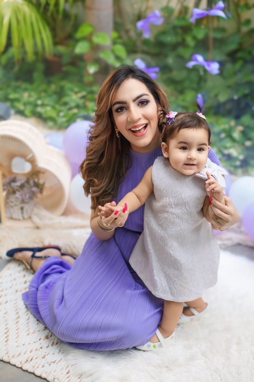 The mama behind Mama Baby Marketplace with her baby